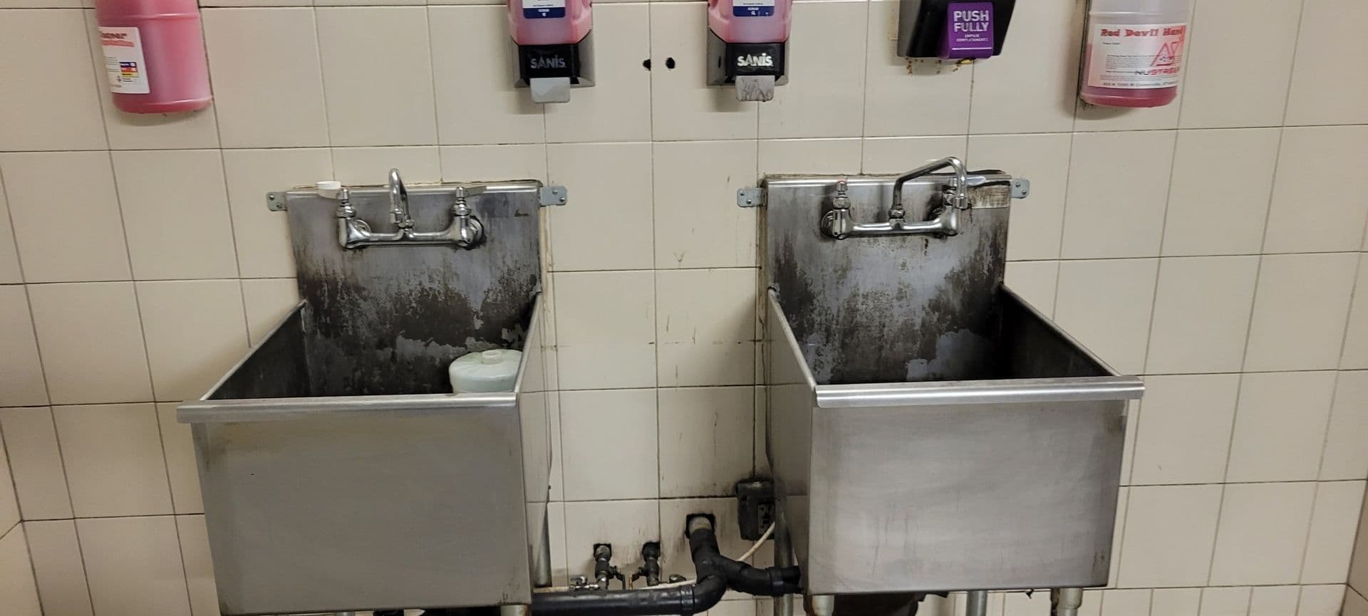 Commercial sink cleaning — before
